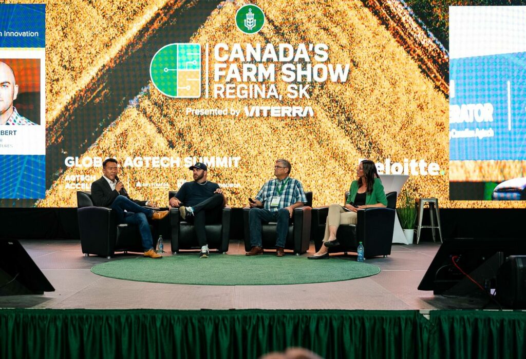 Global Agtech Summit Stage featuring four panelist on stage